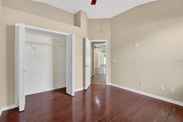 a bathroom with a tub a sink and mirrors