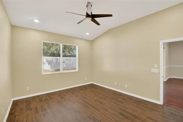 a white toilet sitting next to a shower