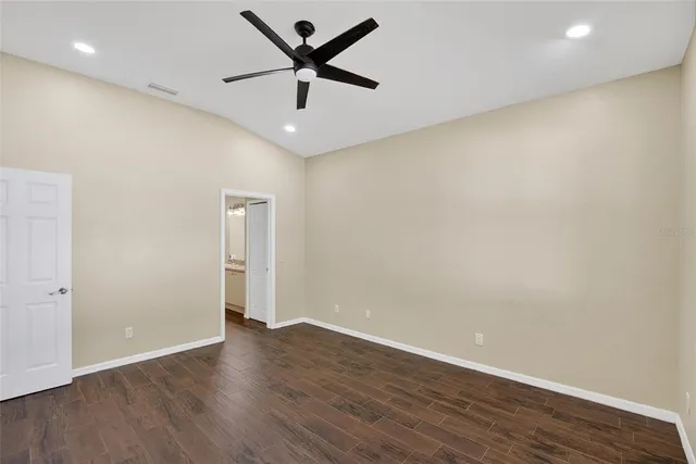 a view of a livingroom with closet and furniture