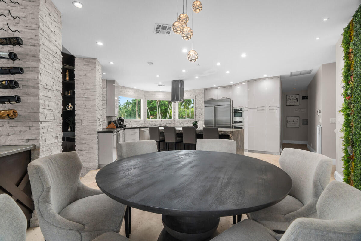 3500 Windmill Ranch Road Weston, FL 33331 - Photo 18 of 47 a view of a dining room with furniture