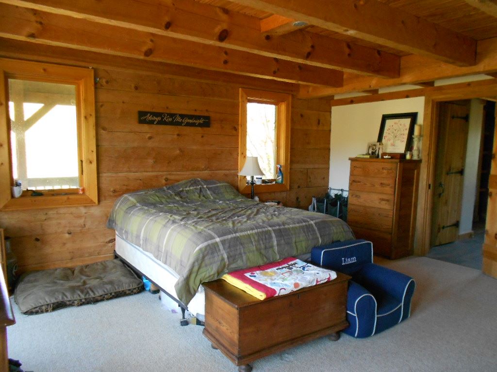573 South F T Valley Road Banco, VA 22727 - Photo 5 of 14 a bedroom with a bed and a dresser