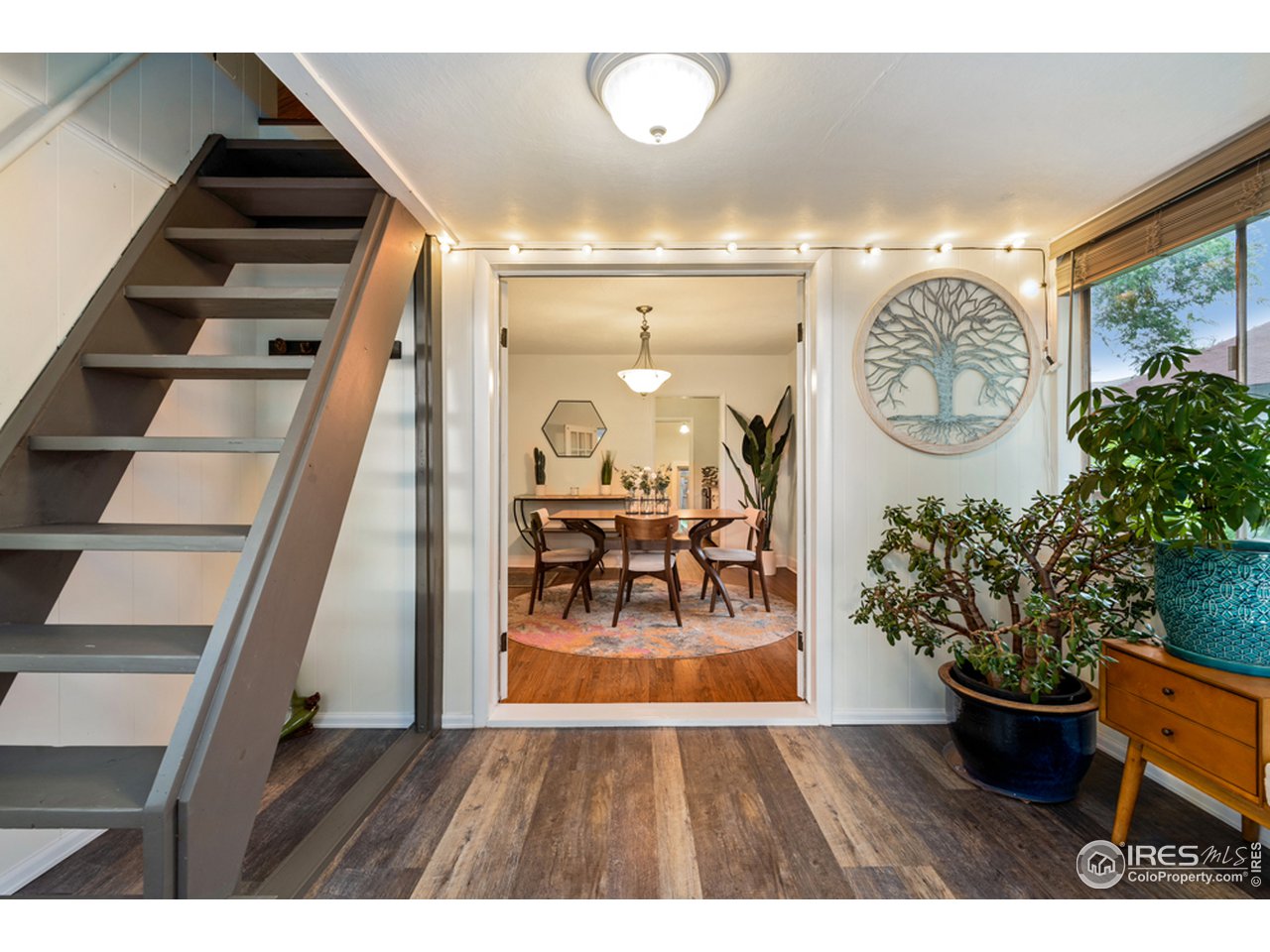 314 South Shields Street Fort Collins, CO 80521 - Photo 5 of 35 a view of entryway with wooden floor
