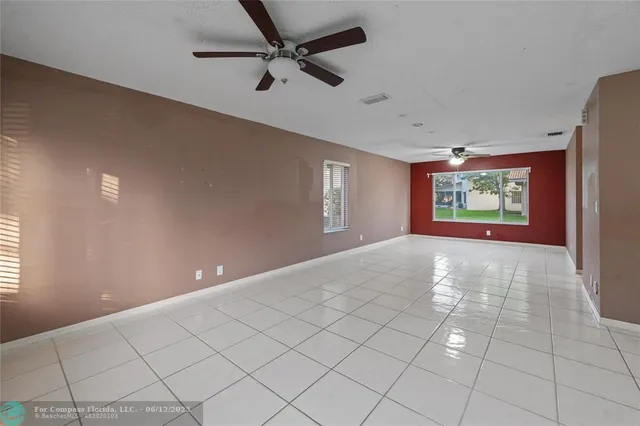 a view of an empty room and window