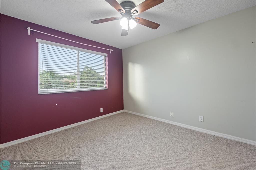 10772 Southwest 14th Place Davie, FL 33324 - Photo 17 of 19 a view of an empty room with a window