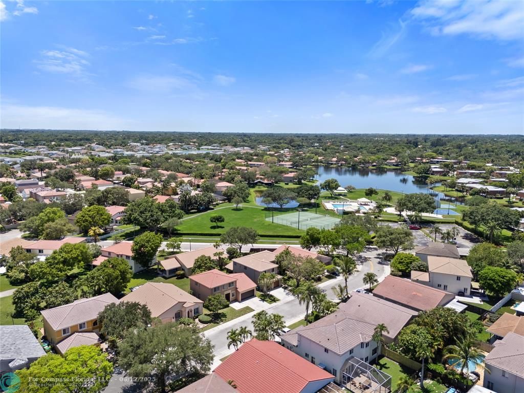 10772 Southwest 14th Place Davie, FL 33324 - Photo 3 of 19 an aerial view of residential houses with outdoor space