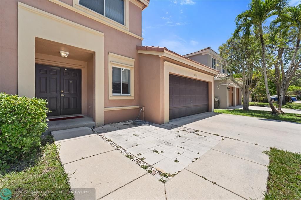 10772 Southwest 14th Place Davie, FL 33324 - Photo 10 of 19 a house view with a backyard space