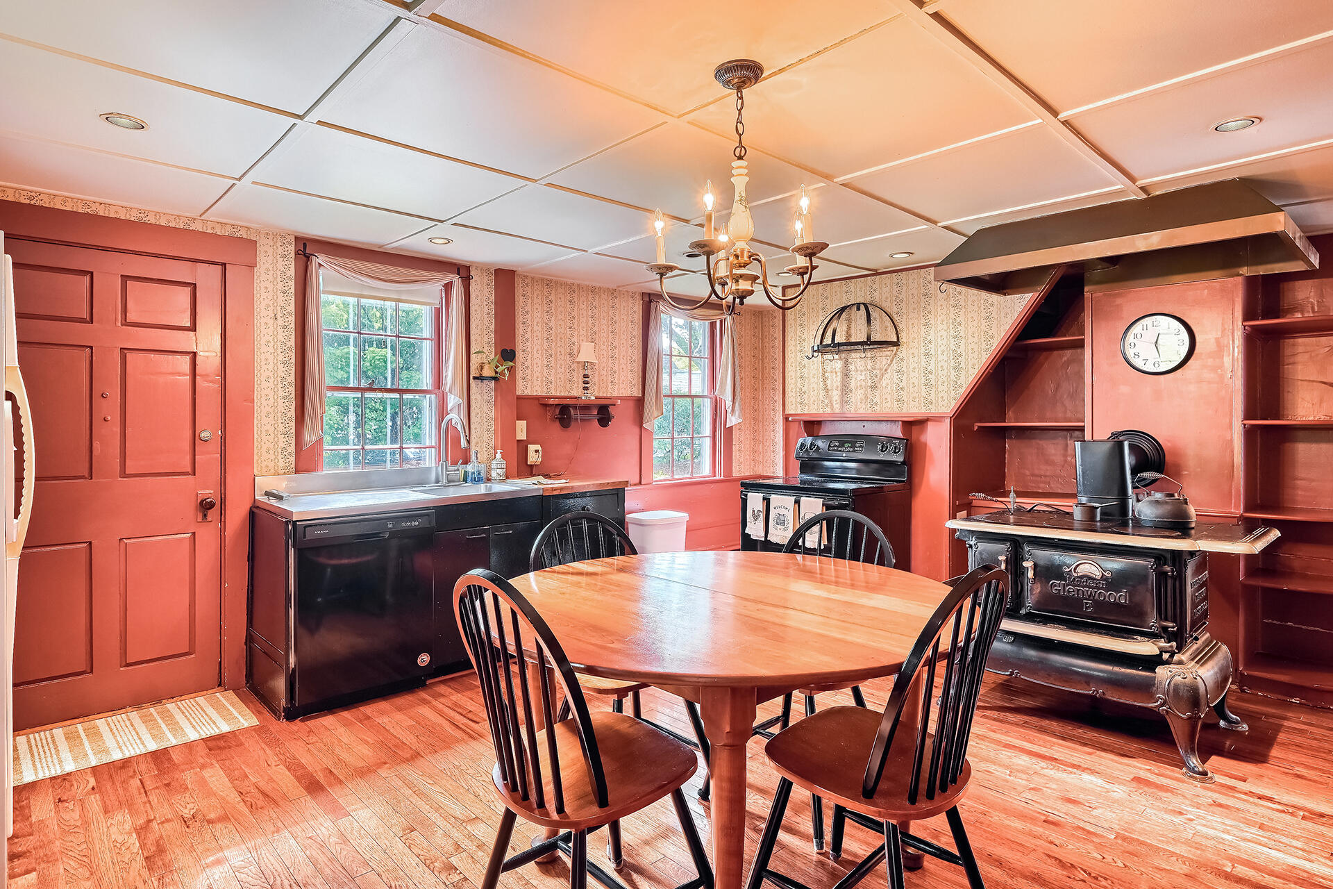 497 Main Street Centerville, MA 02632 - Photo 11 of 50 a view of a dining room with furniture window and wooden floor