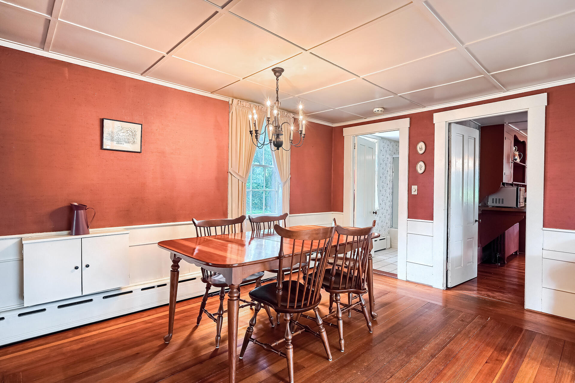 497 Main Street Centerville, MA 02632 - Photo 15 of 50 a dining room with furniture and wooden floor