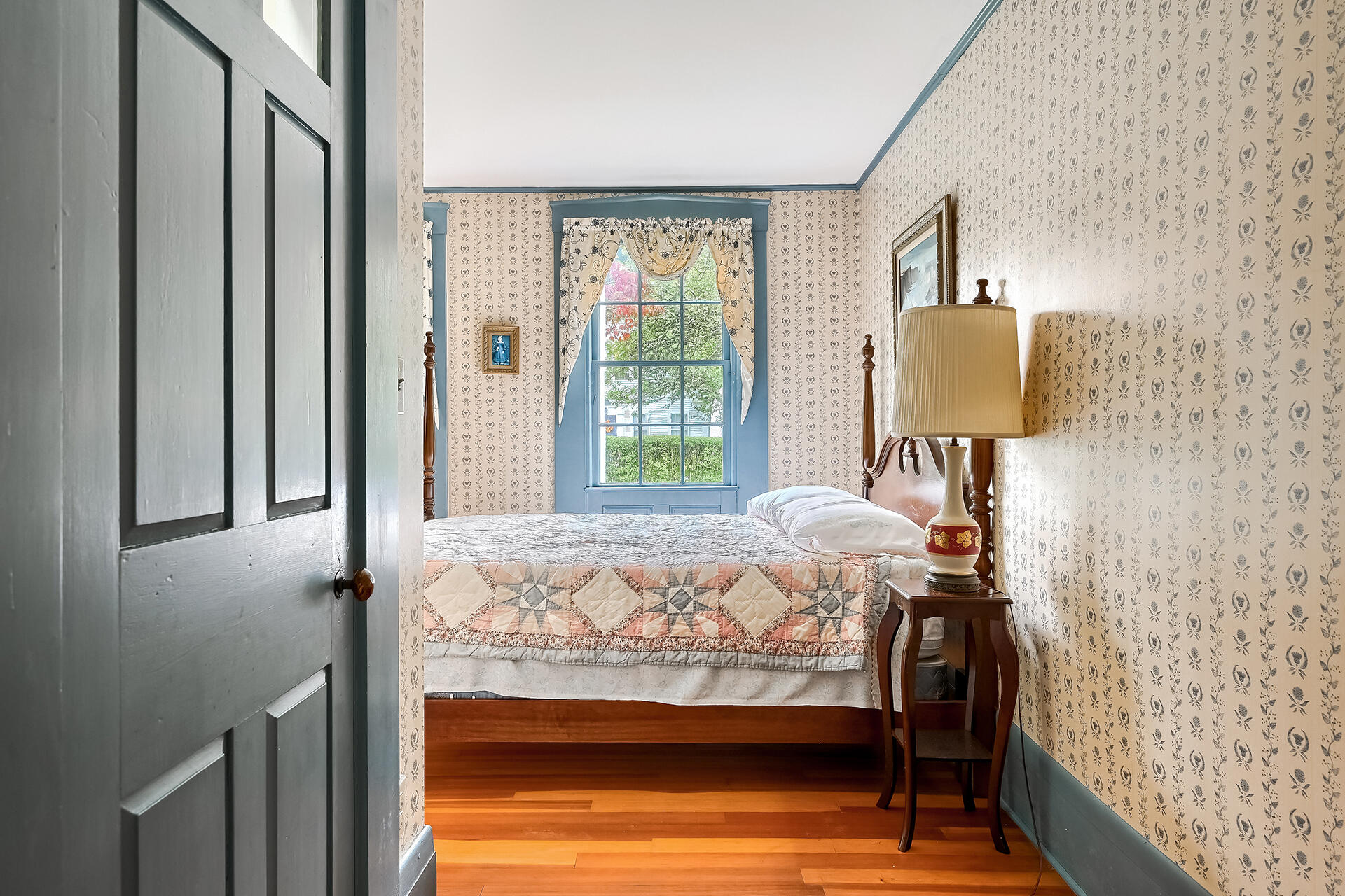 497 Main Street Centerville, MA 02632 - Photo 16 of 50 a bedroom with a bed and a window