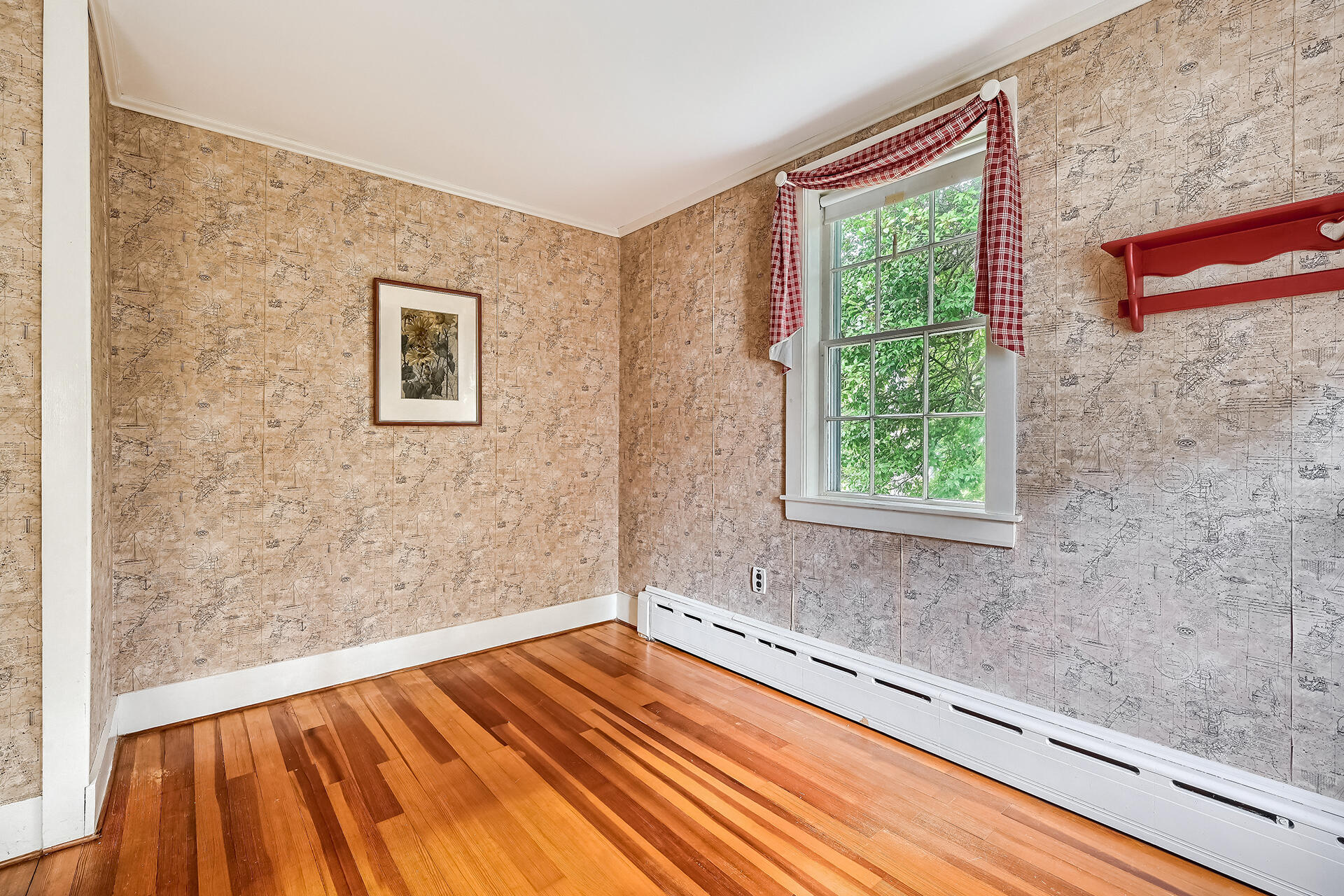 497 Main Street Centerville, MA 02632 - Photo 22 of 50 a view of a room with wooden floor and a window