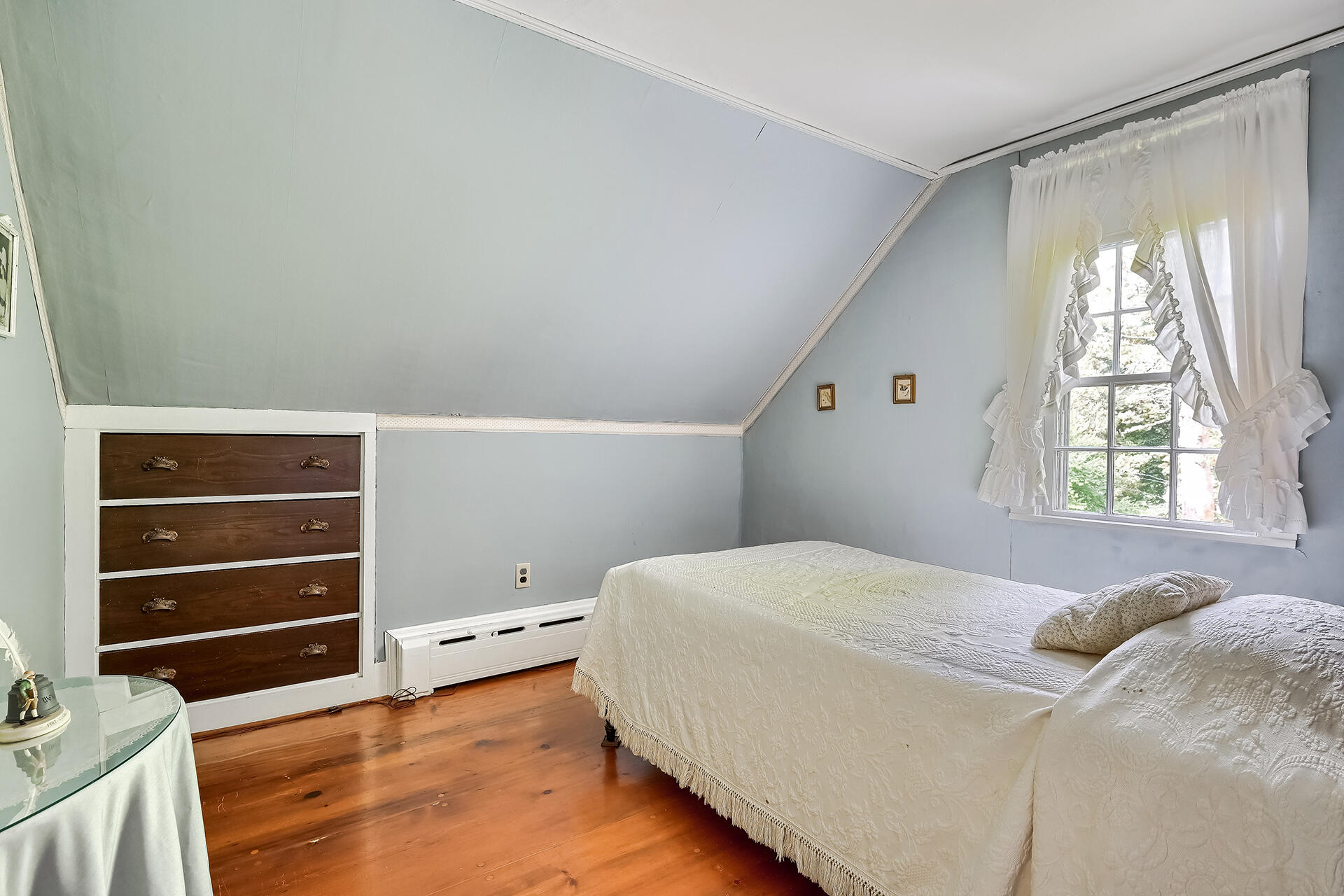 497 Main Street Centerville, MA 02632 - Photo 27 of 50 a bedroom with a bed and a window