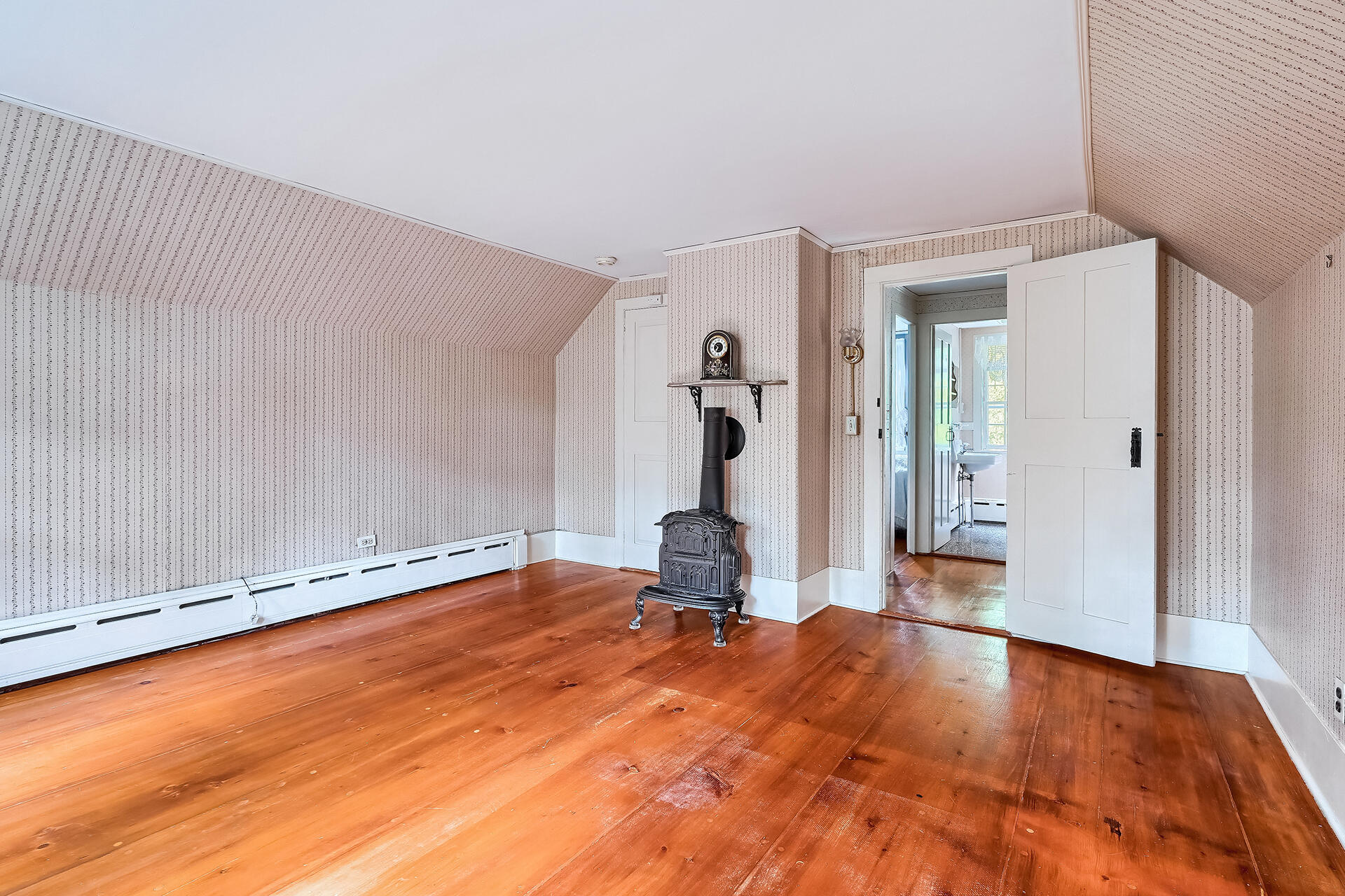 497 Main Street Centerville, MA 02632 - Photo 30 of 50 a view of empty room with wooden floor and fan