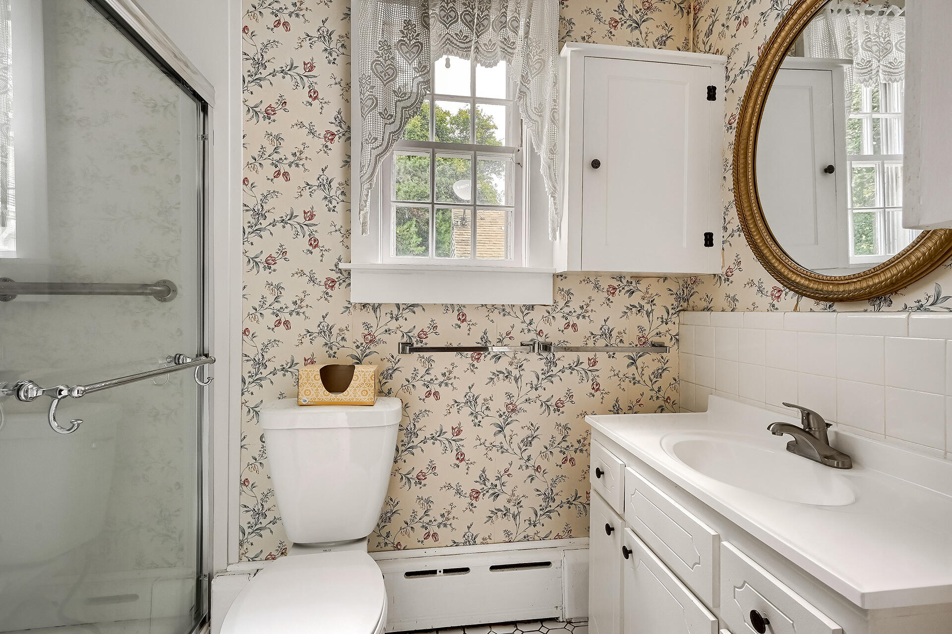 497 Main Street Centerville, MA 02632 - Photo 34 of 50 a bathroom with a sink and a mirror