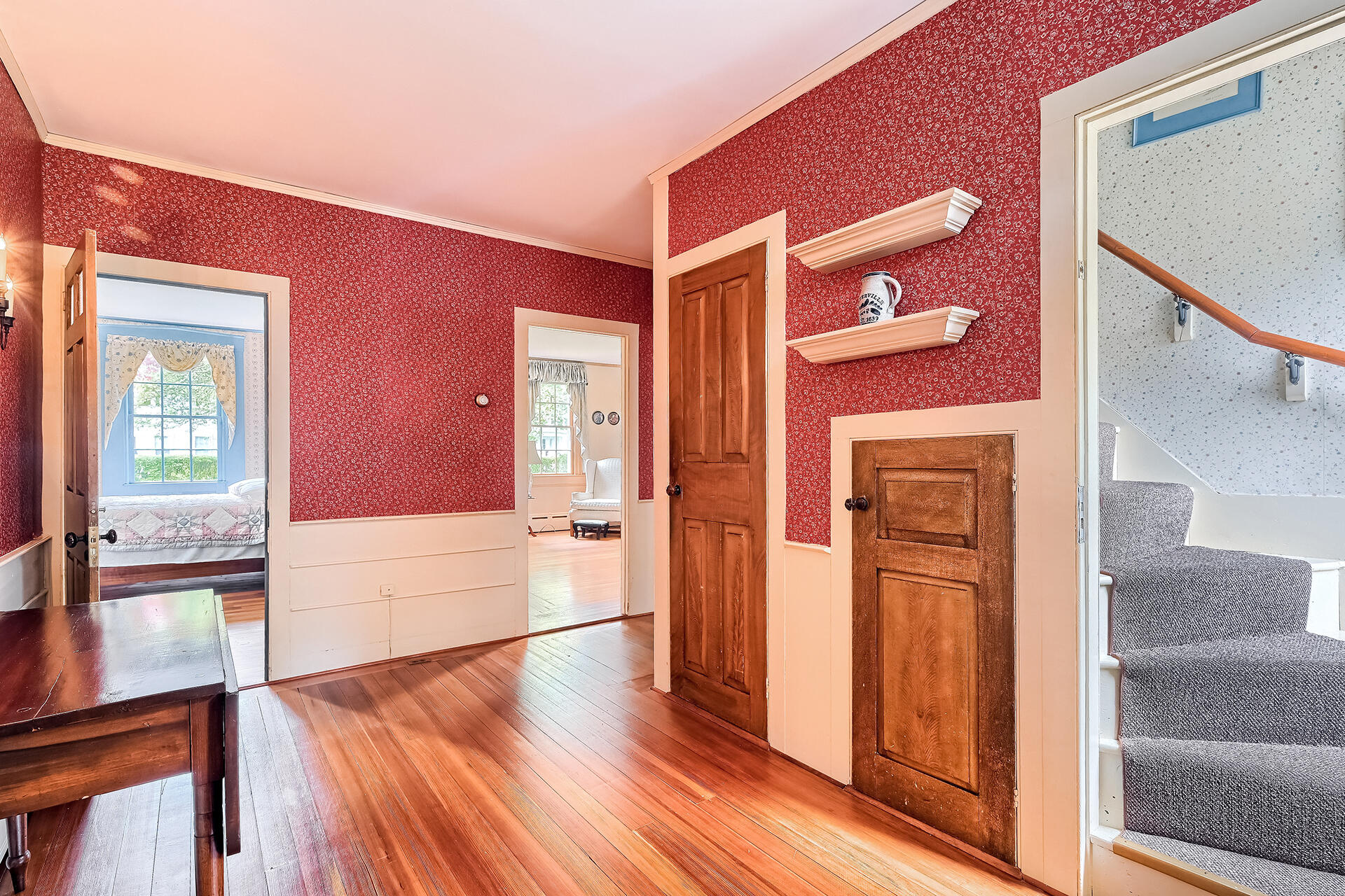 497 Main Street Centerville, MA 02632 - Photo 39 of 50 a view of a hallway with wooden floor and staircase