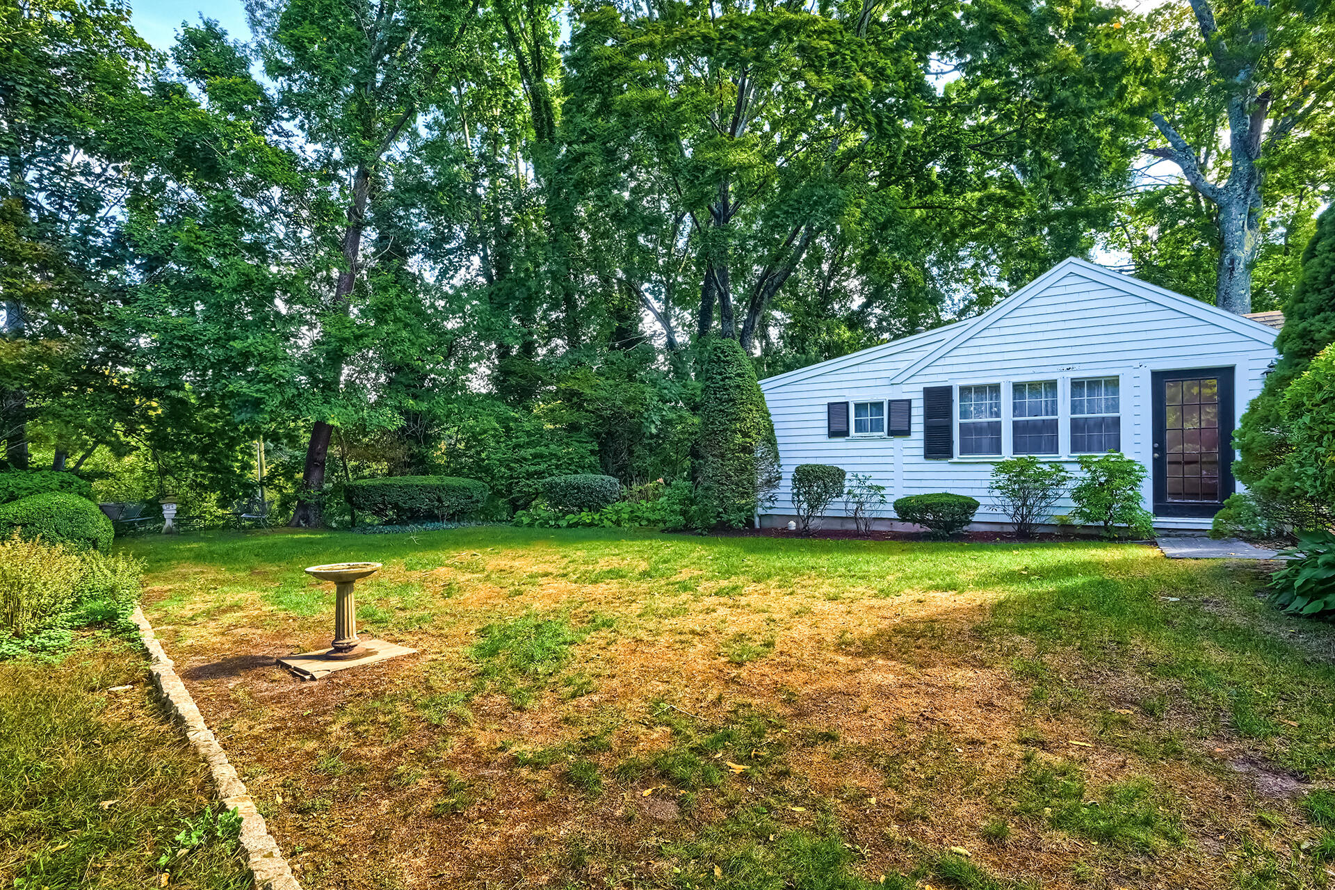 497 Main Street Centerville, MA 02632 - Photo 47 of 50 a front view of a house with a yard