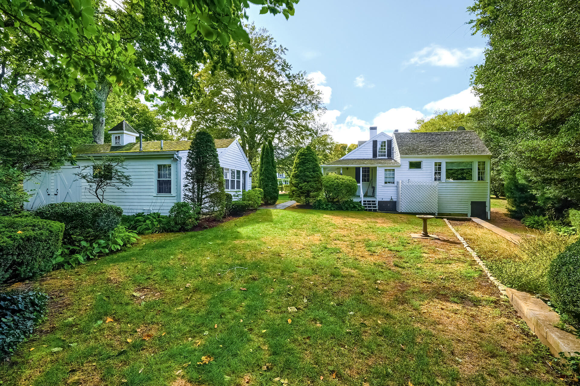497 Main Street Centerville, MA 02632 - Photo 48 of 50 a view of a house with a yard