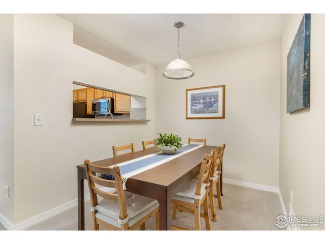 a bathroom with a sink mirror and toilet