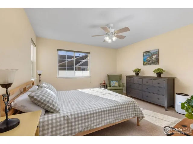 a bedroom with a bed and furniture