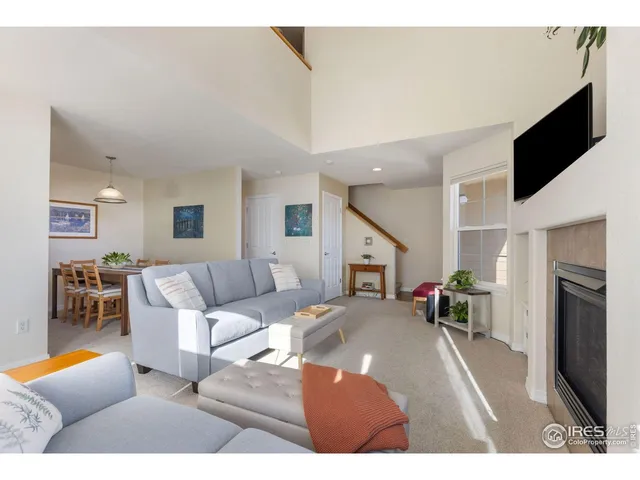 a kitchen with a stove a sink and a refrigerator