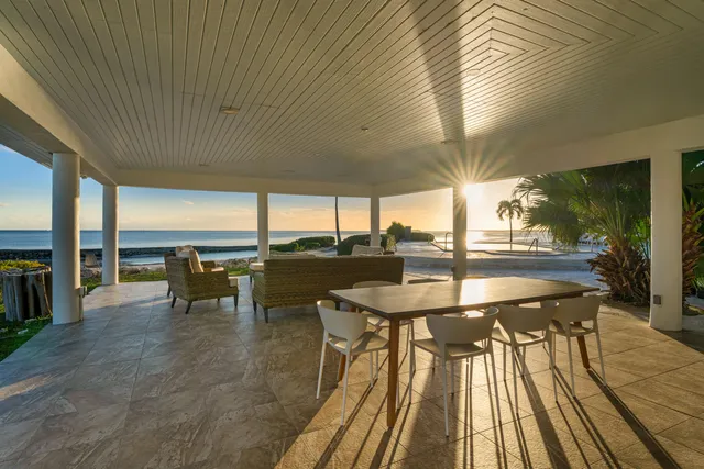 a kitchen with stainless steel appliances granite countertop a refrigerator sink and stove