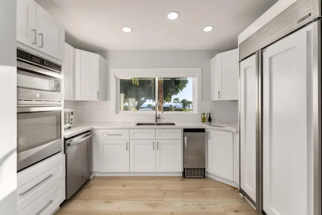 a room with a bed and a view of bathroom