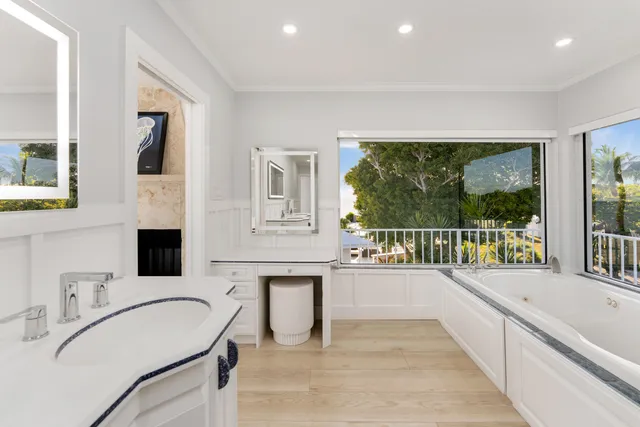 a view of a swimming pool with an outdoor seating