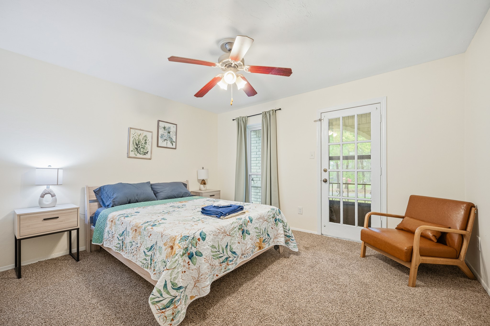 16811 Waycreek Road Houston, TX 77068 - Photo 42 of 50 a bedroom with a bed and a chandelier