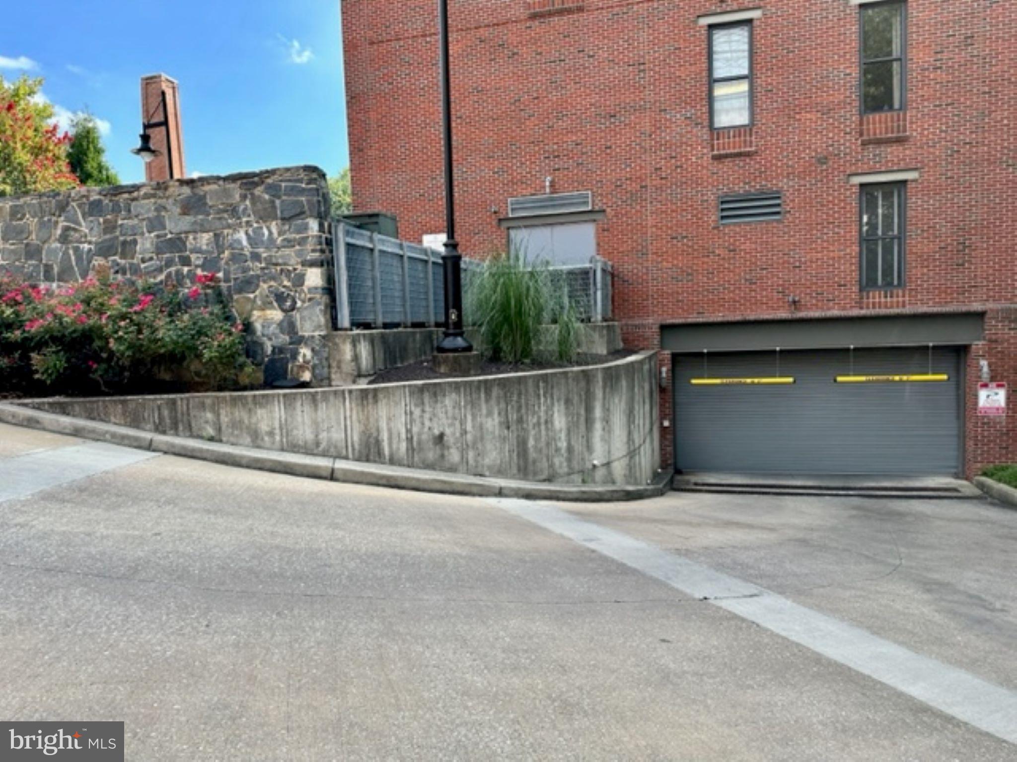 2007 Clipper Park Road, Unit 417 Baltimore, MD 21211 - Photo 6 of 24 Garage Entrance w/designated parking spot