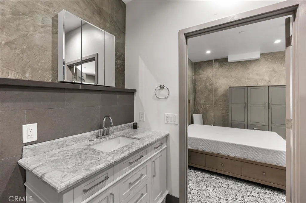 2211 Hyperion Avenue Los Angeles, CA 90027 - Photo 12 of 15 a bathroom with a sink and a mirror