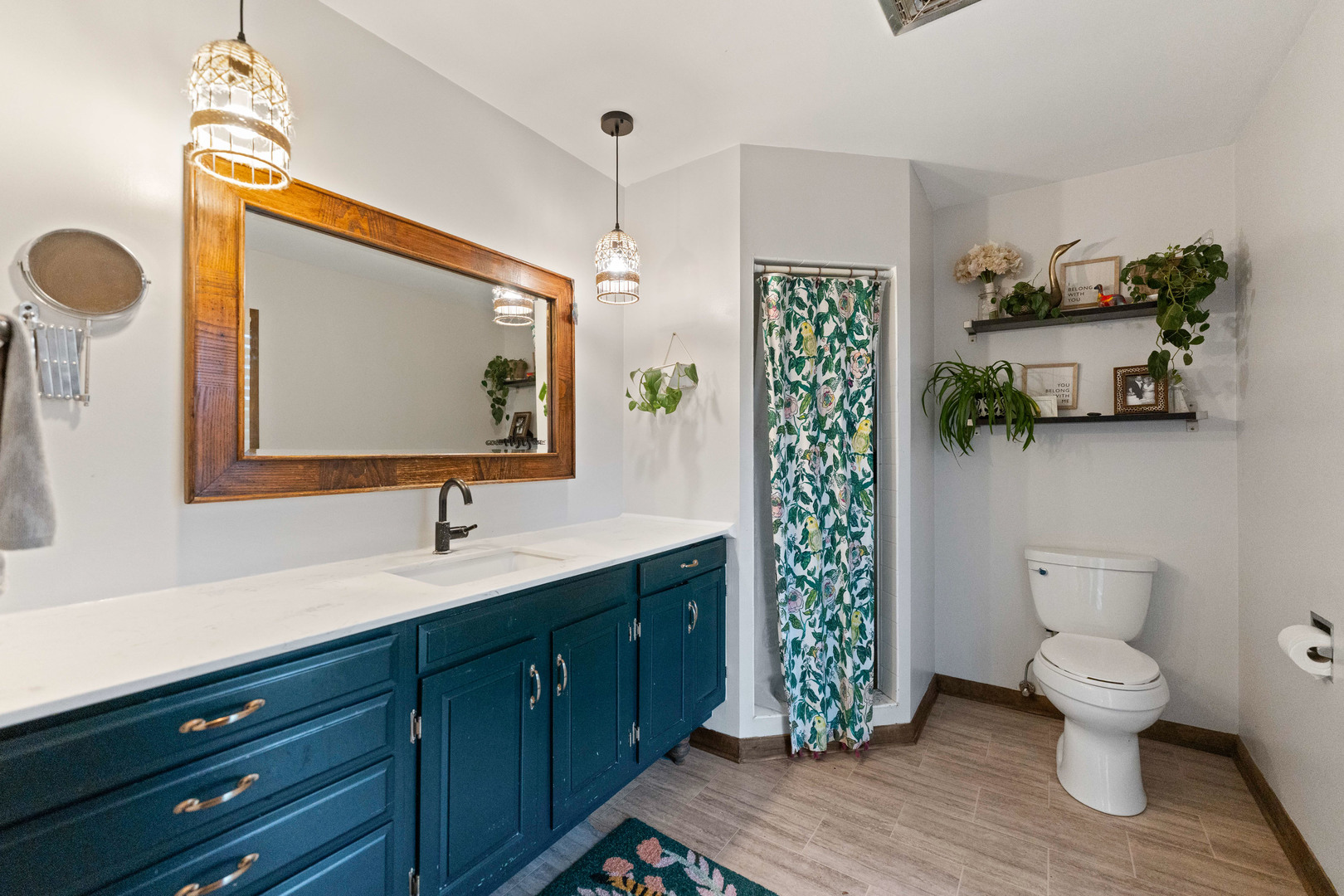 120 Stoney Creek Road DeKalb, IL 60115 - Photo 12 of 32 a bathroom with a toilet sink and mirror