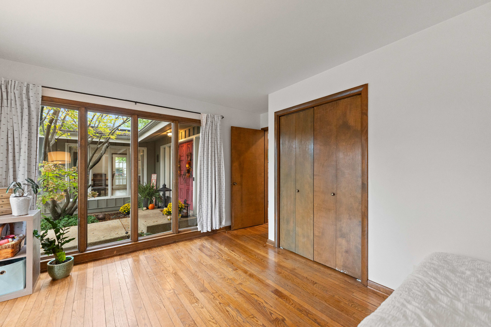120 Stoney Creek Road DeKalb, IL 60115 - Photo 14 of 32 a view of livingroom with furniture and floor to ceiling window