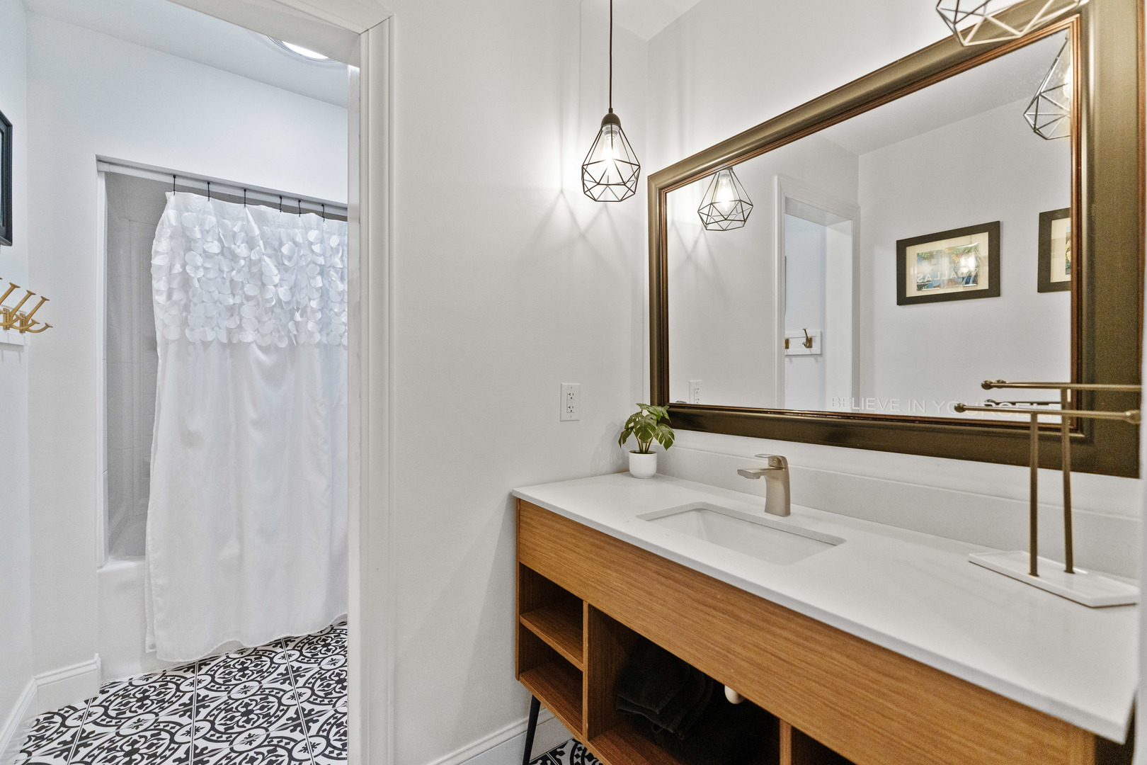 120 Stoney Creek Road DeKalb, IL 60115 - Photo 16 of 32 a bathroom with a sink and a mirror
