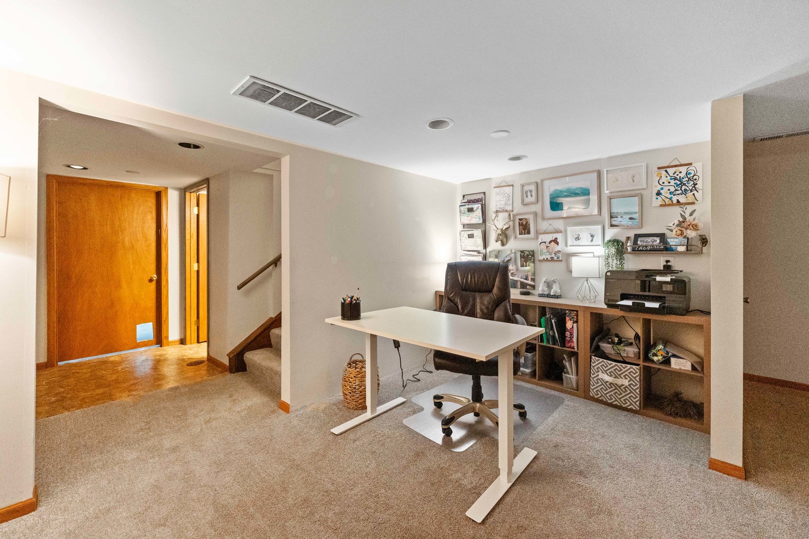 120 Stoney Creek Road DeKalb, IL 60115 - Photo 19 of 32 a view of a workspace with furniture and a window