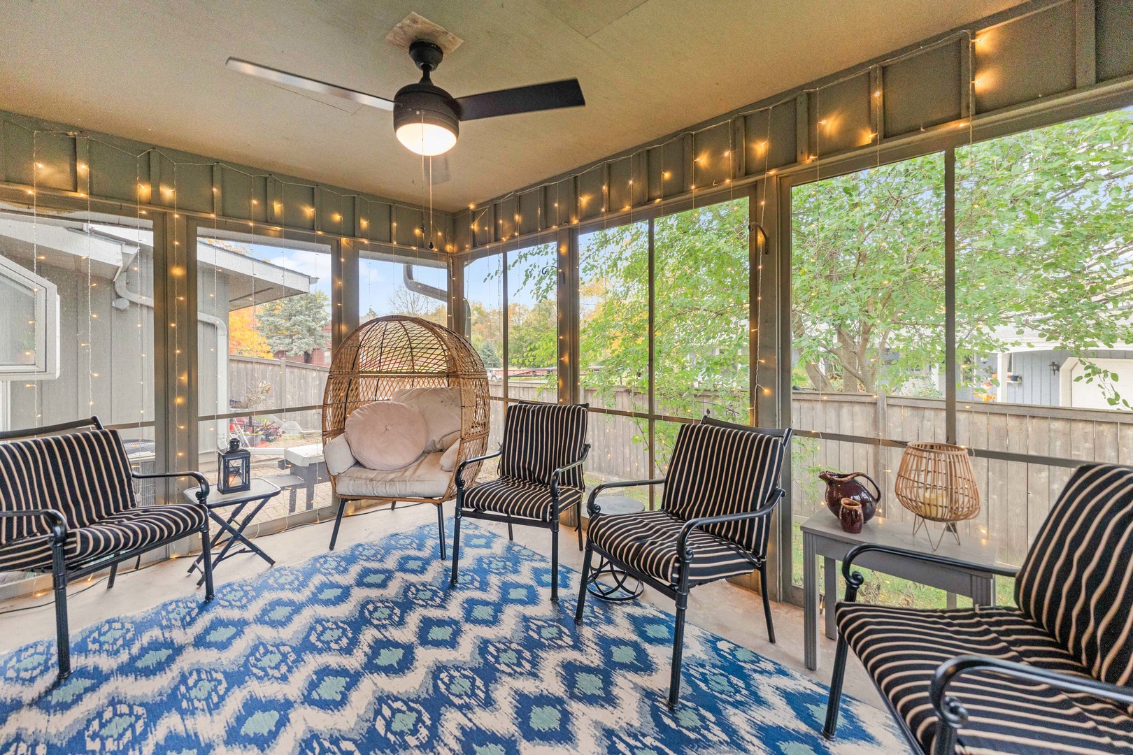 120 Stoney Creek Road DeKalb, IL 60115 - Photo 24 of 32 a living room with furniture and a large window