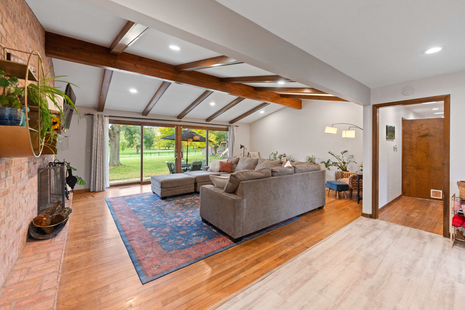 120 Stoney Creek Road DeKalb, IL 60115 - Photo 3 of 32 a living room with furniture and a large window