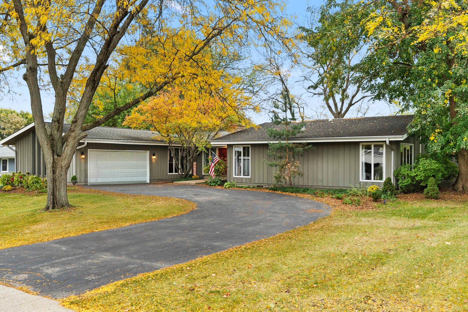120 Stoney Creek Road DeKalb, IL 60115 - Photo 32 of 32 a front view of a house with a yard and garage