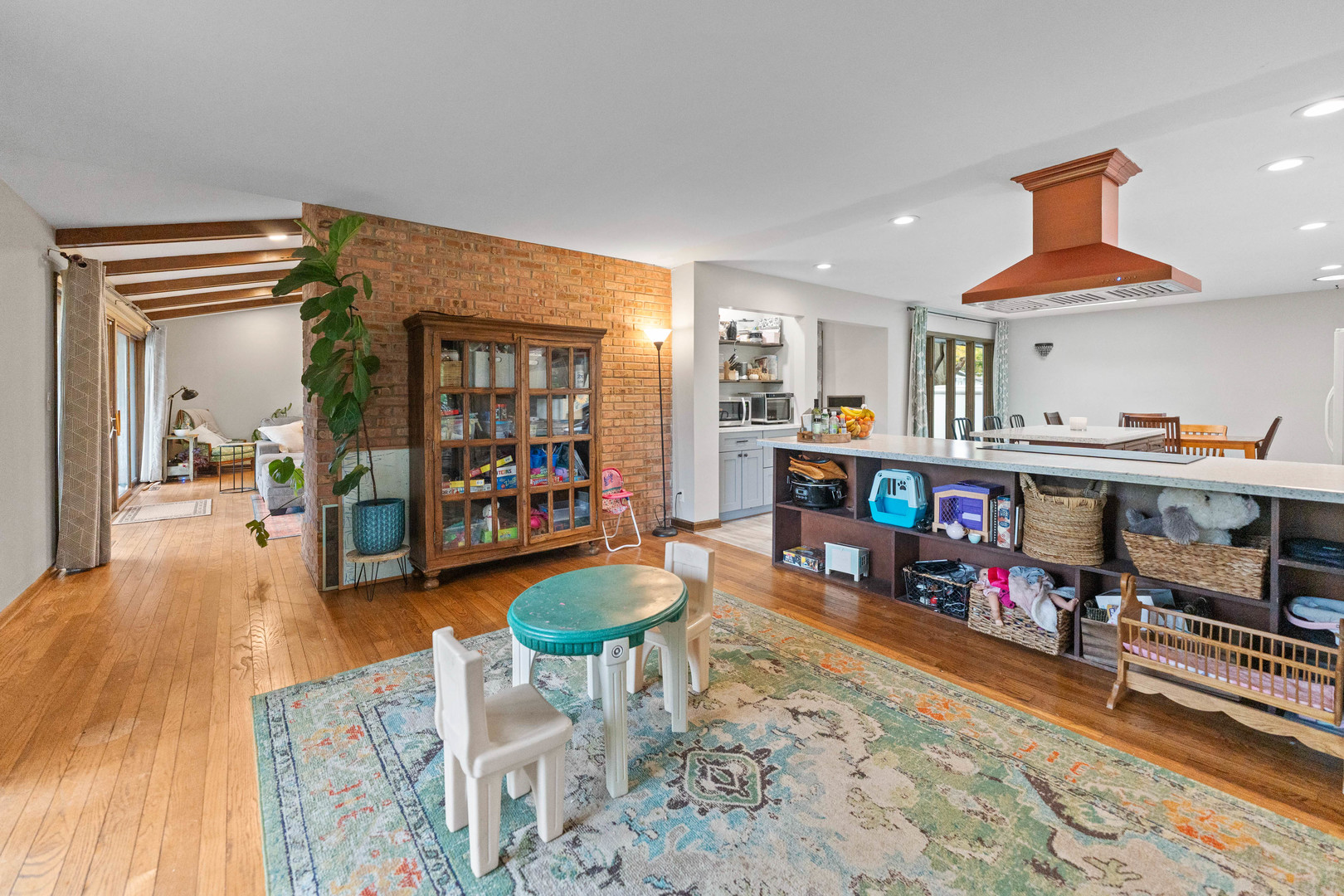 120 Stoney Creek Road DeKalb, IL 60115 - Photo 8 of 32 a living room with furniture and a wooden floor