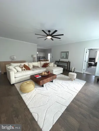 a view of table and chairs in the room
