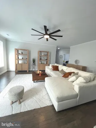 a view of a dining room with furniture and window