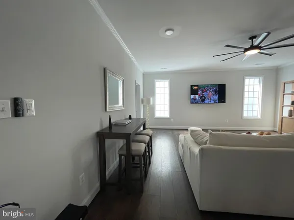 a bathroom with a double vanity sink mirror and shower
