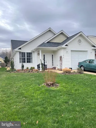 a view of entryway with a front door