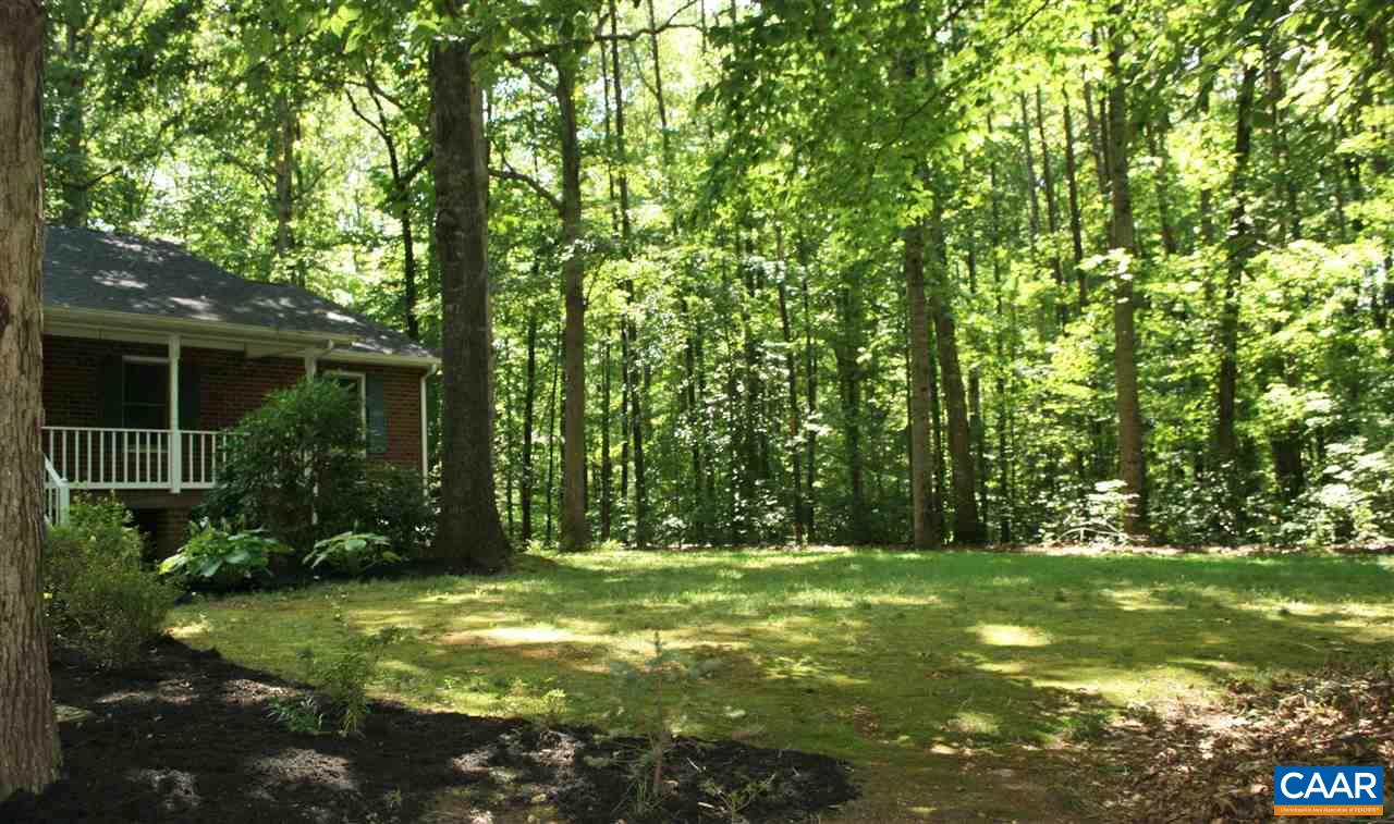 102 Thacker Road Mineral, VA 23117 - Photo 18 of 25 a view of outdoor space with deck and yard