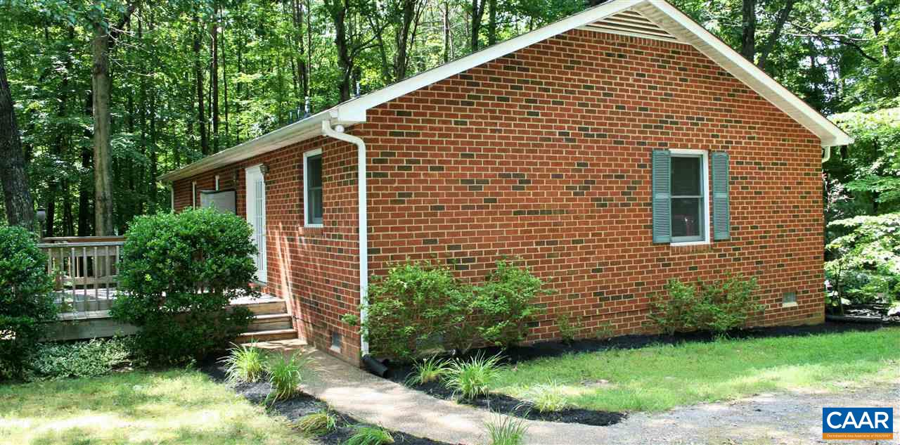 102 Thacker Road Mineral, VA 23117 - Photo 21 of 25 a front view of a house with garden