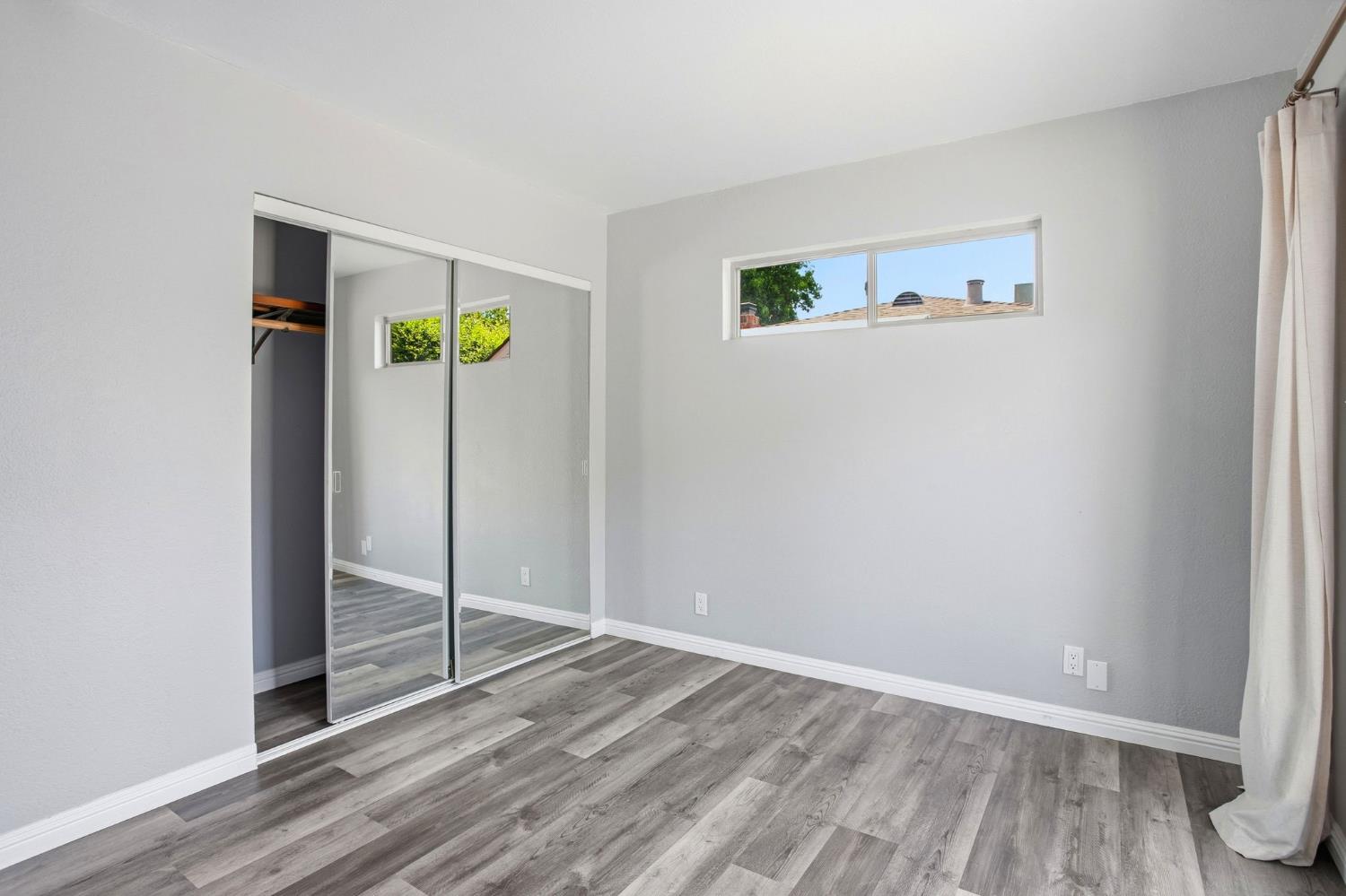 4617 Robertson Avenue Sacramento, CA 95821 - Photo 21 of 37 Primary bedroom closet has mirrored doors.