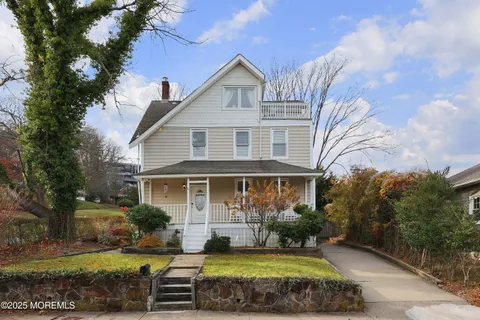 a view of a house with a swimming pool