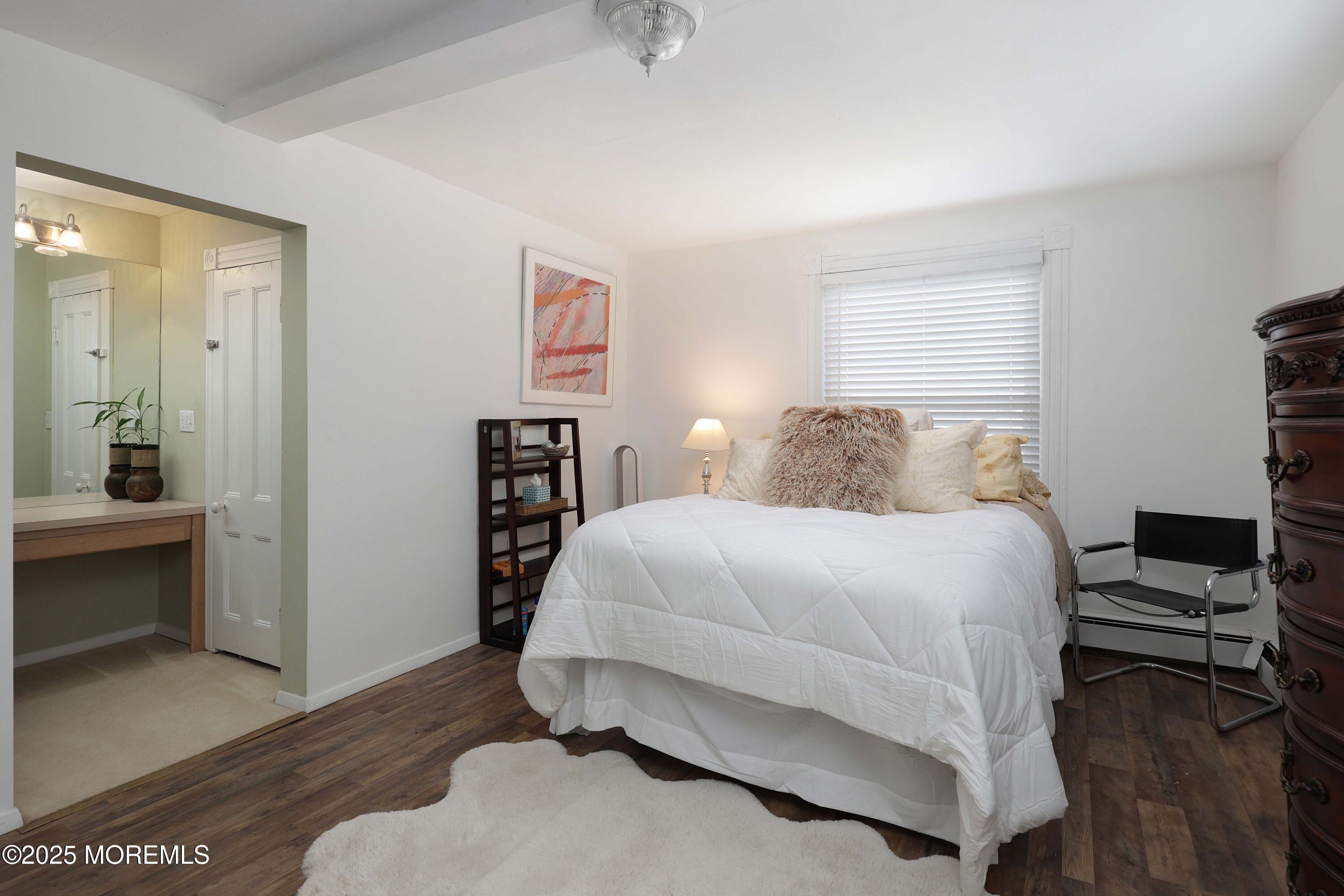 75 Portland Road Highlands, NJ 07732 - Photo 22 of 56 a bedroom with a bed and a television