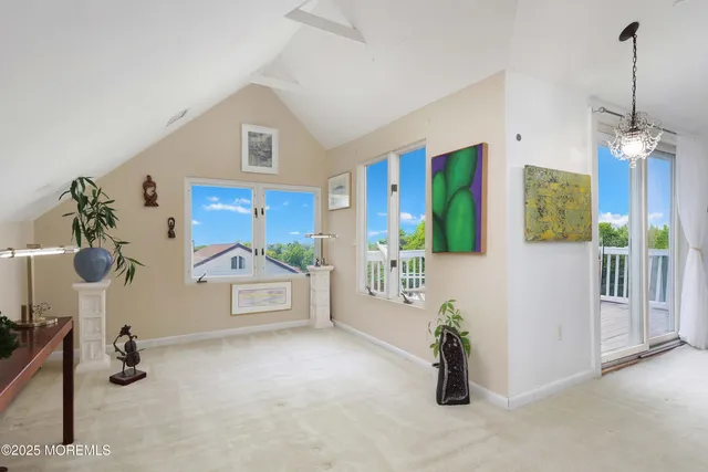 a view of livingroom with furniture and windows