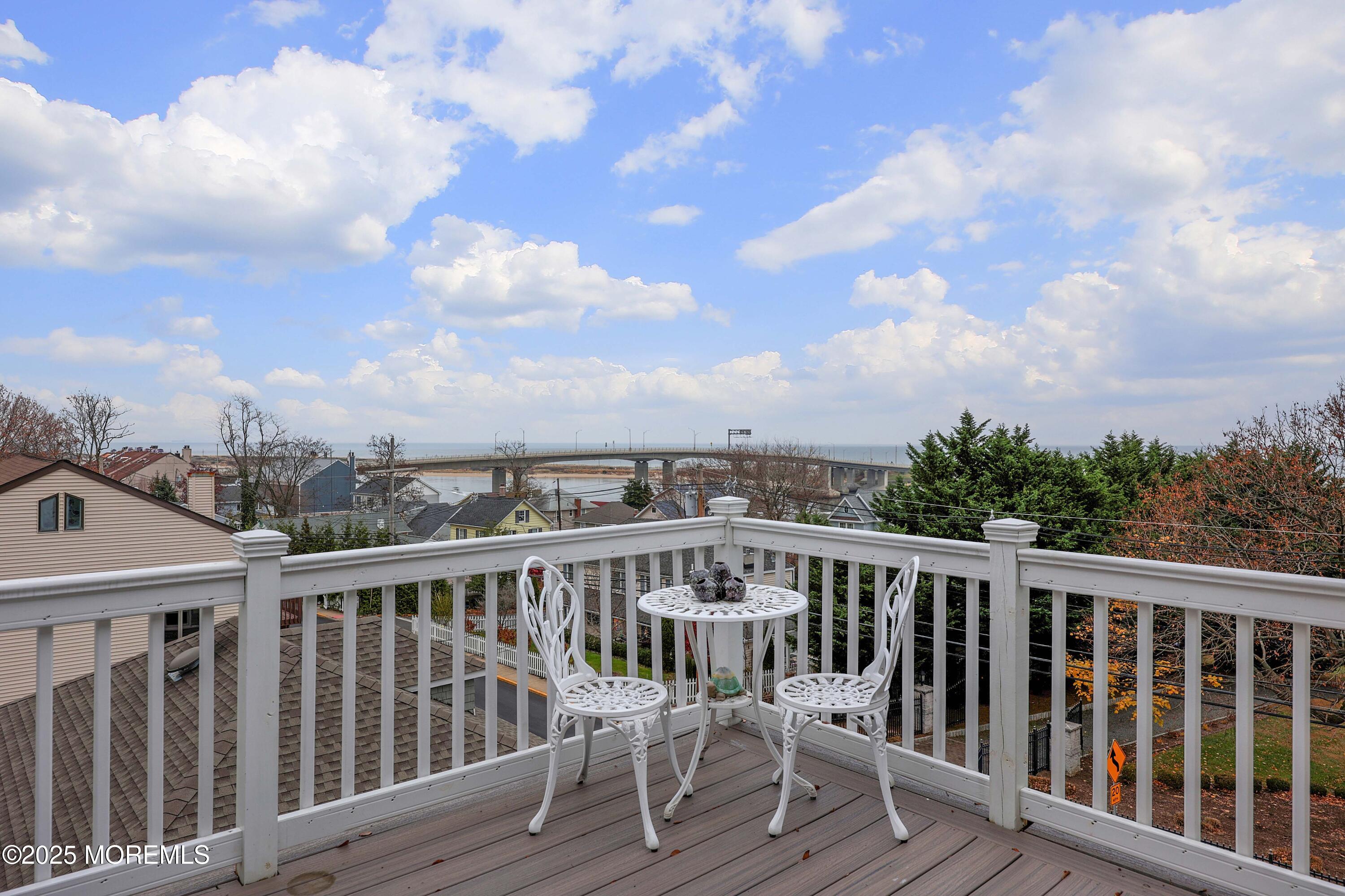 75 Portland Road Highlands, NJ 07732 - Photo 29 of 56 a view of a balcony with wooden fence