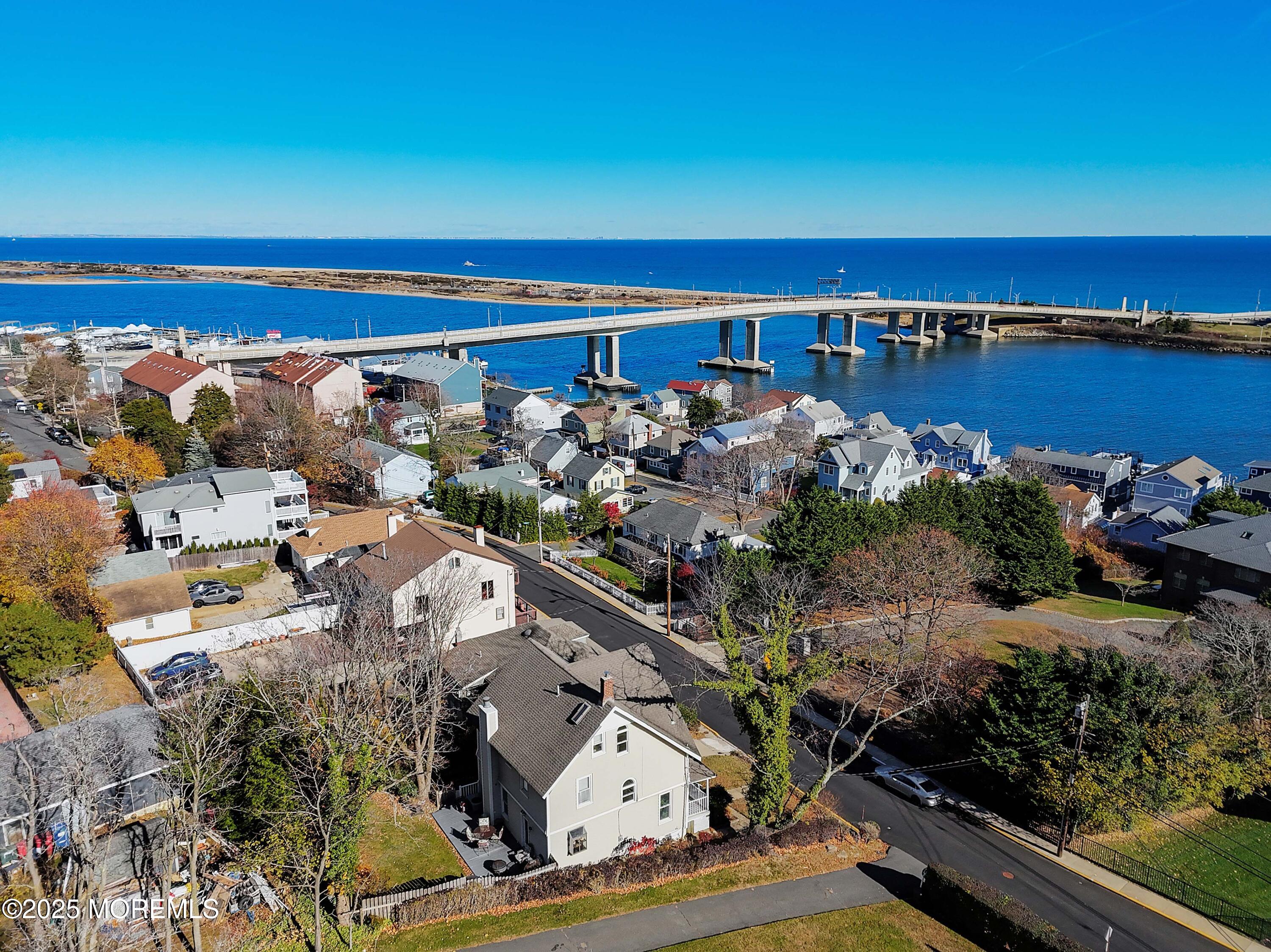75 Portland Road Highlands, NJ 07732 - Photo 30 of 56 an aerial view of ocean and residential houses with outdoor space