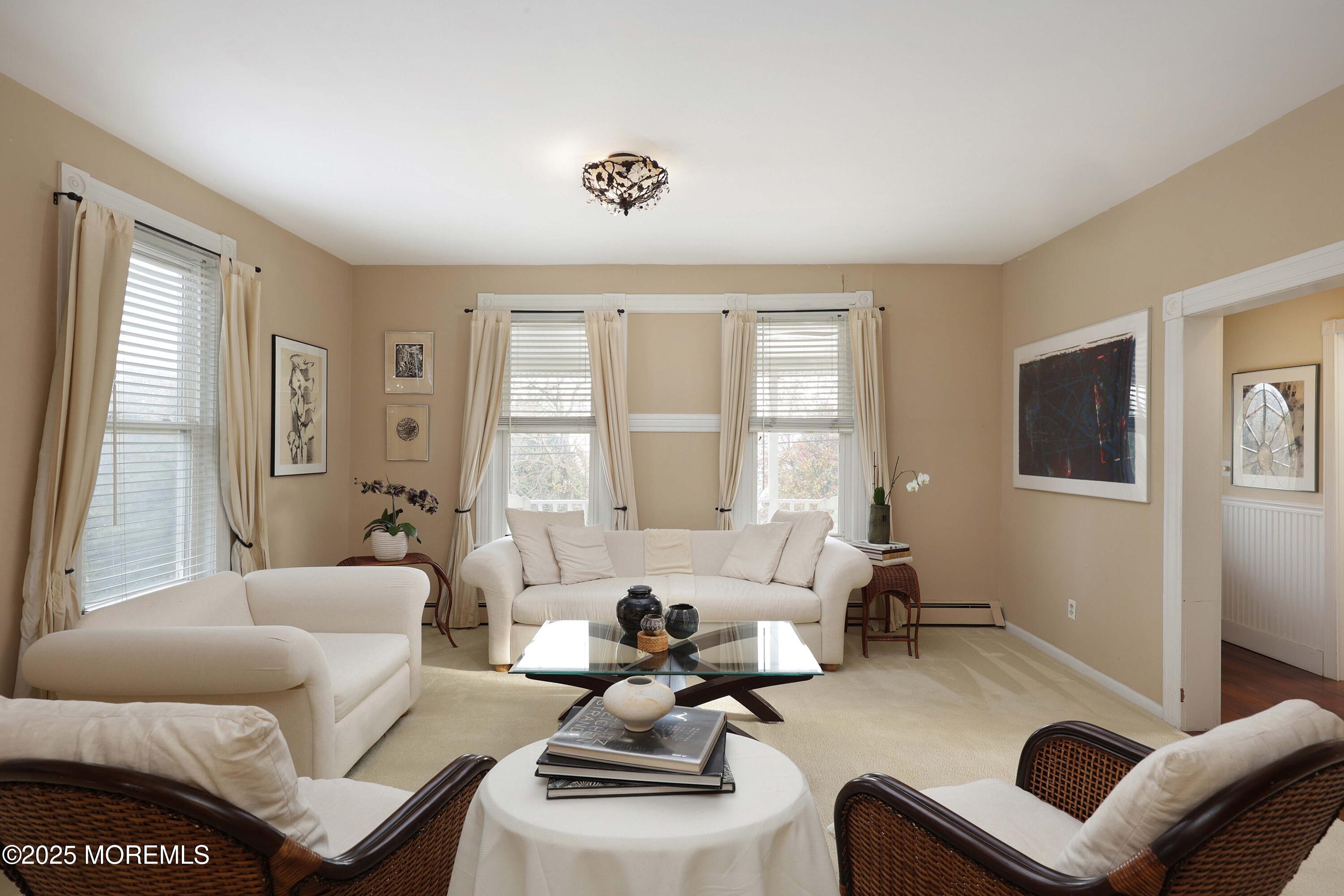 75 Portland Road Highlands, NJ 07732 - Photo 8 of 56 a living room with furniture and a large window